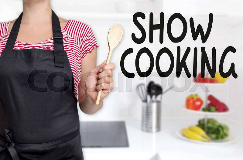 Show cooking cook holding wooden spoon background concept, stock photo