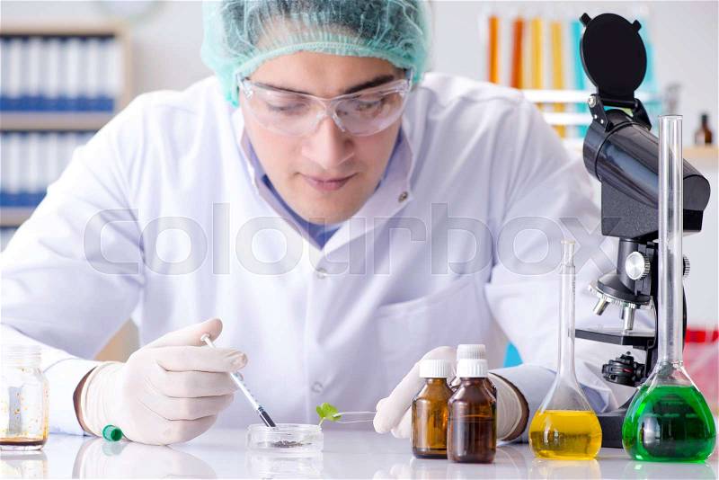 Pharmaceutical industry concept with scientist in the lab, stock photo