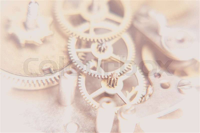 Mechanical watches mechanism very close up, blurred background for design, stock photo