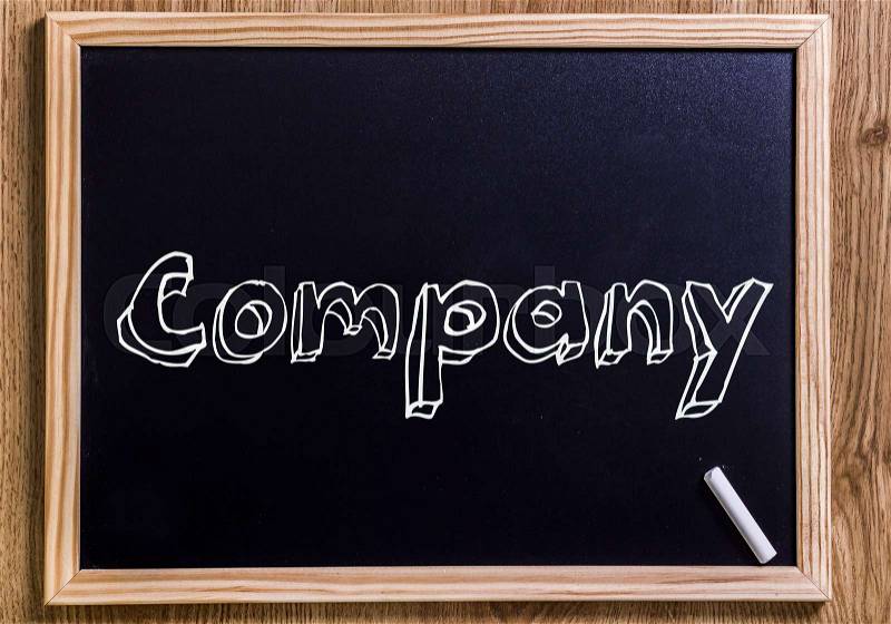 Company - New chalkboard with outlined text - on wood, stock photo