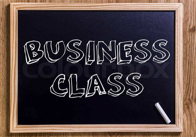 BUSINESS CLASS - New chalkboard with outlined text - on wood, stock photo