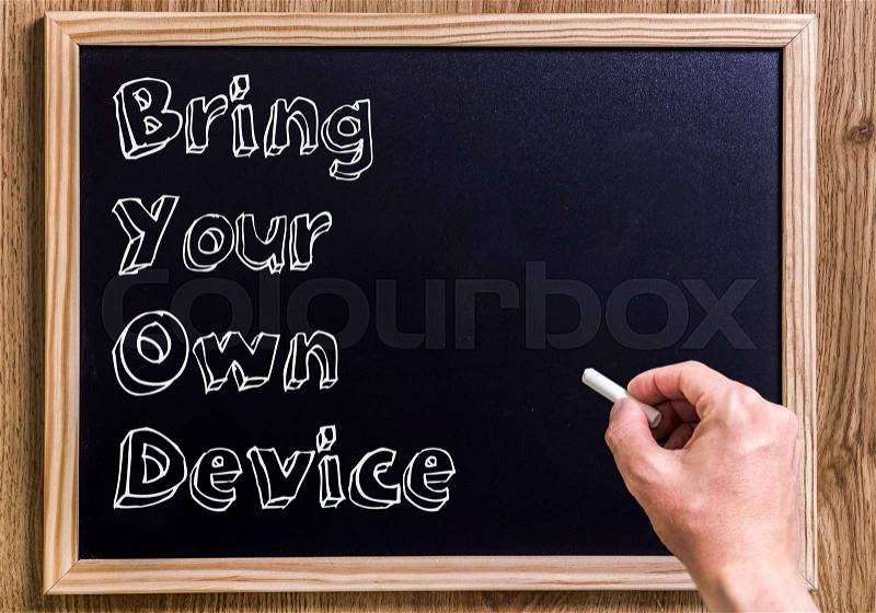 Bring Your Own Device BYOD - New chalkboard with outlined text - on wood, stock photo