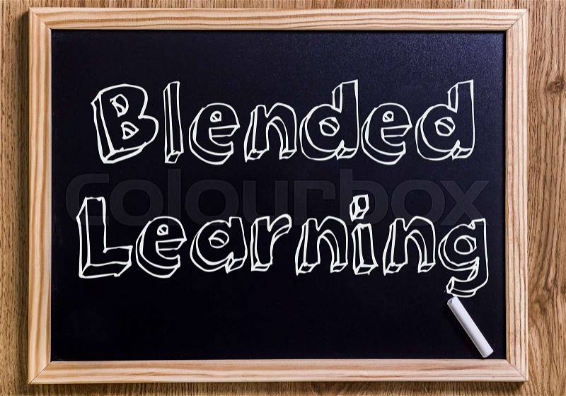 Blended Learning - New chalkboard with outlined text - on wood, stock photo