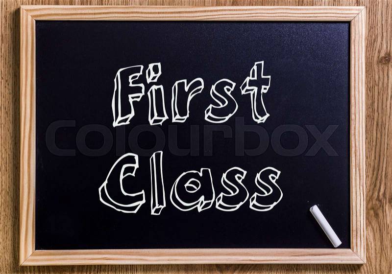 First Class - New chalkboard with outlined text - on wood, stock photo