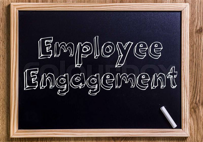 Employee Engagement - New chalkboard with 3D outlined text - on wood, stock photo