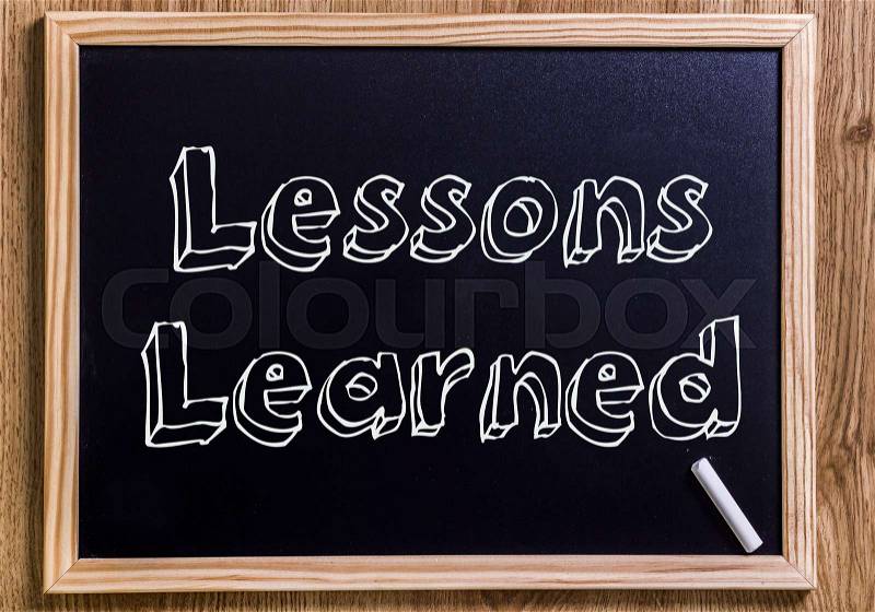 Lessons Learned - New chalkboard with outlined text - on wood, stock photo