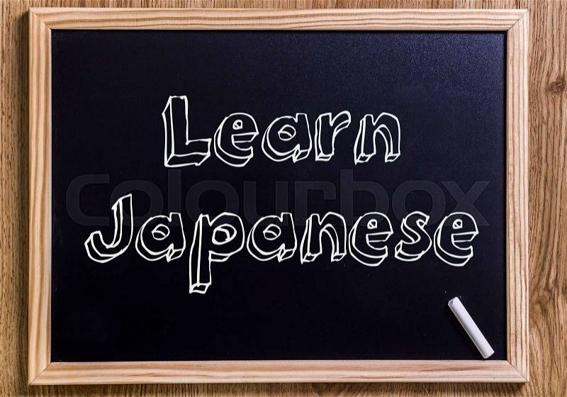 Learn Japanese - New chalkboard with outlined text - on wood, stock photo