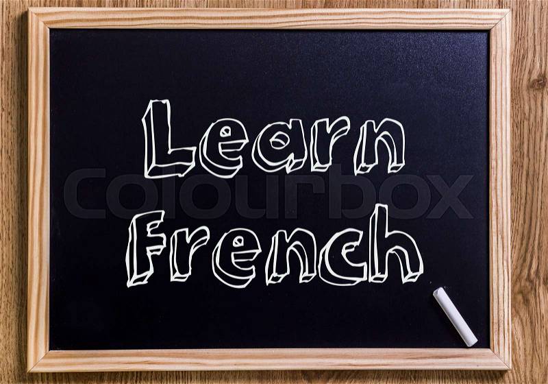Learn French - New chalkboard with outlined text - on wood, stock photo