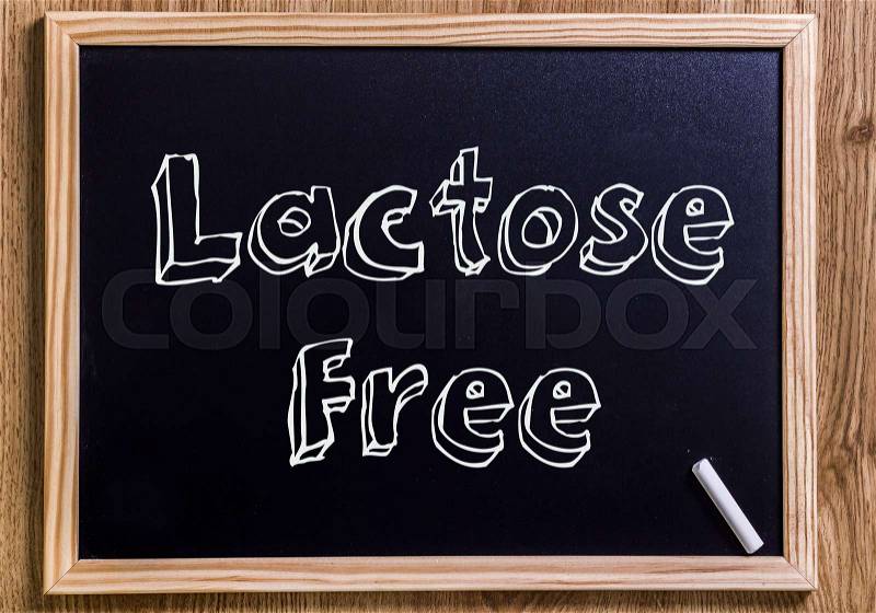 Lactose Free - New chalkboard with outlined text - on wood, stock photo