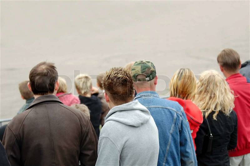 Crowd of people waiting in lines, stock photo