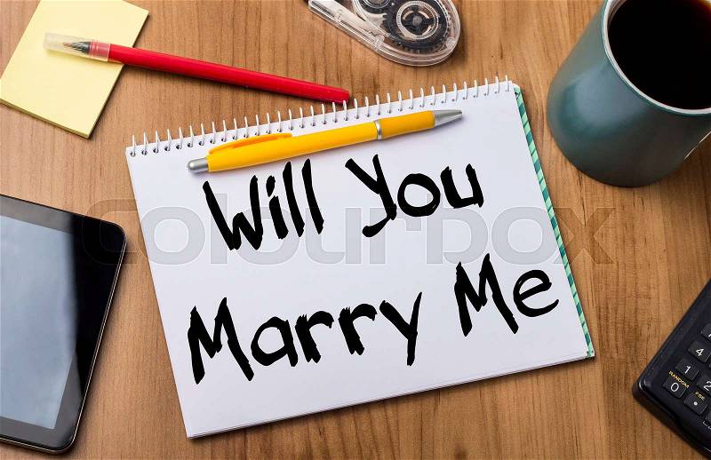 Will You Marry Me - Note Pad With Text On Wooden Table - with office tools, stock photo