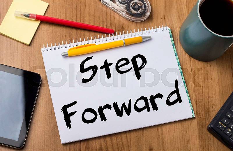 Step Forward - Note Pad With Text On Wooden Table - with office tools, stock photo