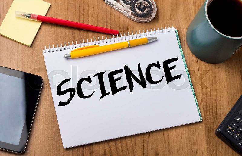 SCIENCE - Note Pad With Text On Wooden Table - with office tools, stock photo