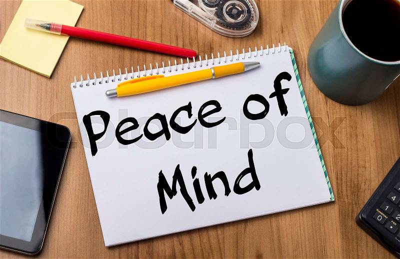 Peace of Mind - Note Pad With Text On Wooden Table - with office tools, stock photo