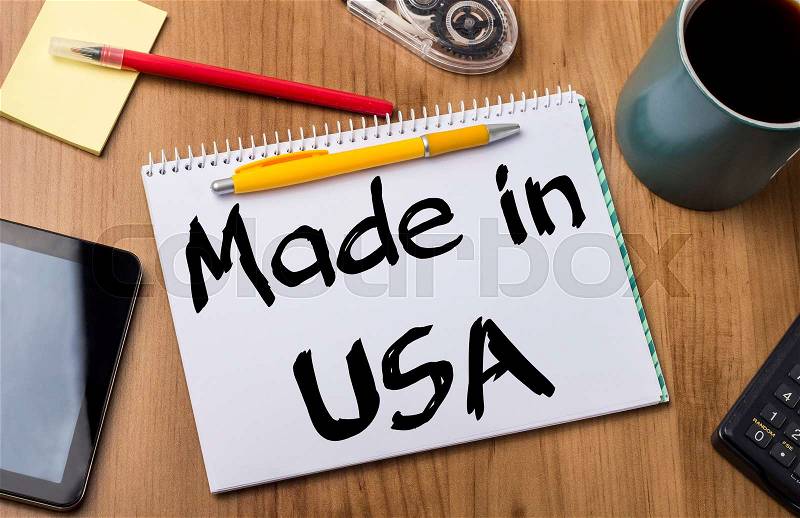 Made in USA - Note Pad With Text On Wooden Table - with office tools, stock photo