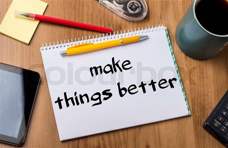 Make Things Better - Note Pad With Text On Wooden Table - with office tools, stock photo