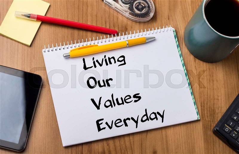 Living Our Values Everyday LOVE - Note Pad With Text On Wooden Table - with office tools, stock photo