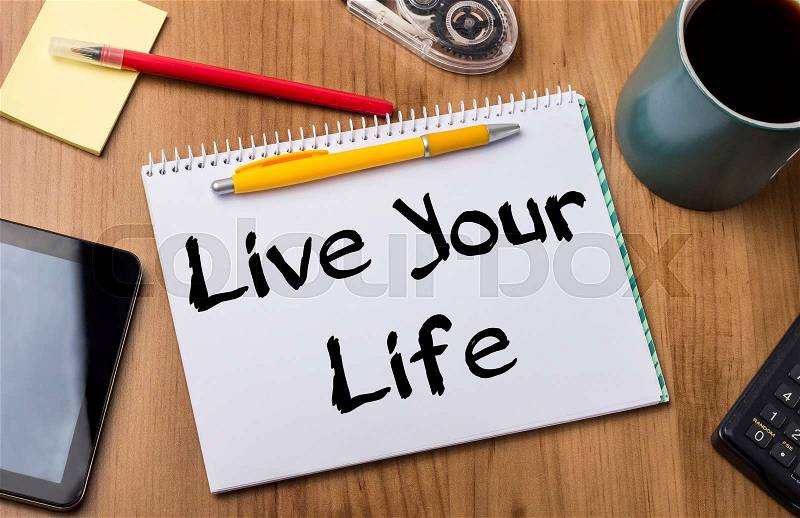 Live Your Life - Note Pad With Text On Wooden Table - with office tools, stock photo