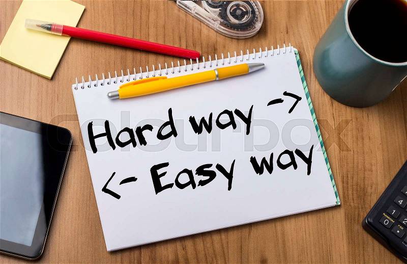 Hard way, Easy way - Note Pad With Text On Wooden Table - with office tools, stock photo