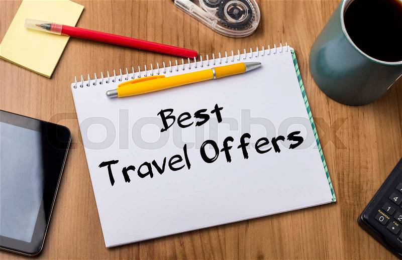 Best Travel Offers - Note Pad With Text On Wooden Table - with office tools, stock photo