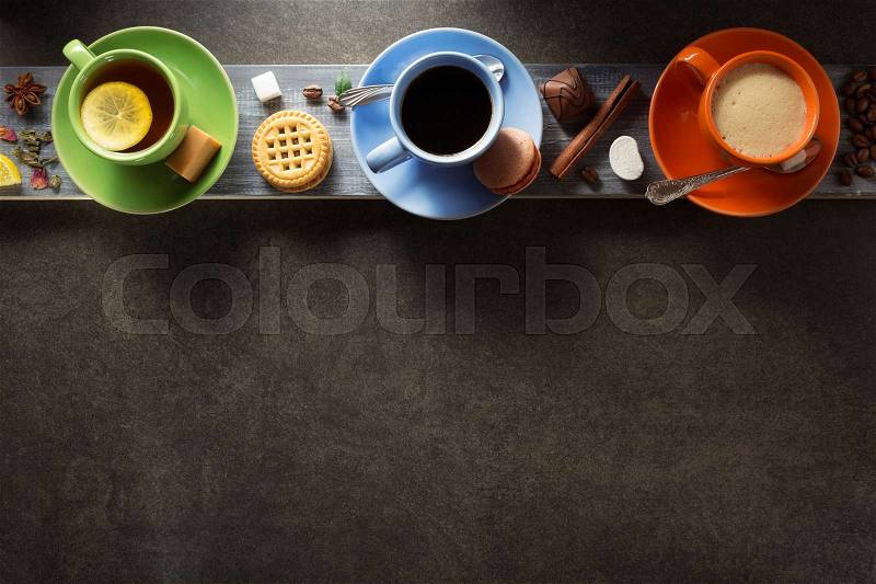 Cup of coffee, cacao and tea on table background, stock photo