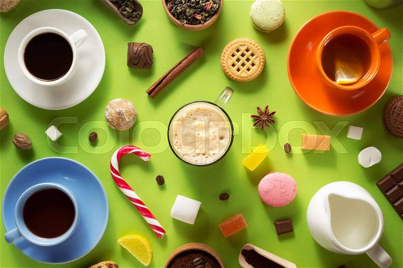 Cup of coffee, tea and cacao at green background, stock photo