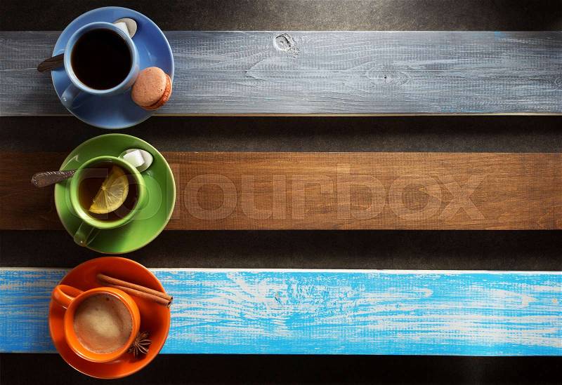 Cup of coffee, cacao and tea at table, stock photo