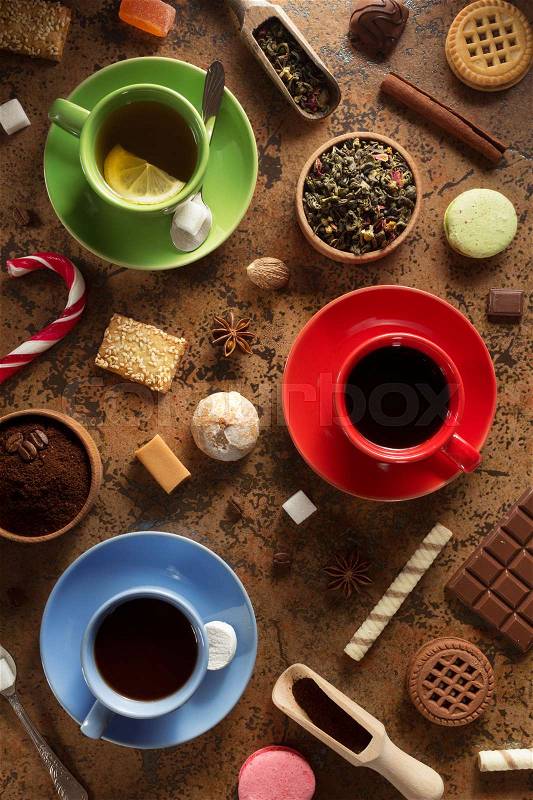Cup of coffee, tea and cacao at table, stock photo