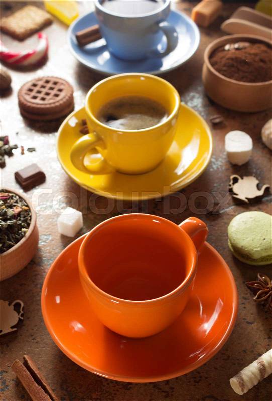Cup of coffee, tea and cacao at table, stock photo