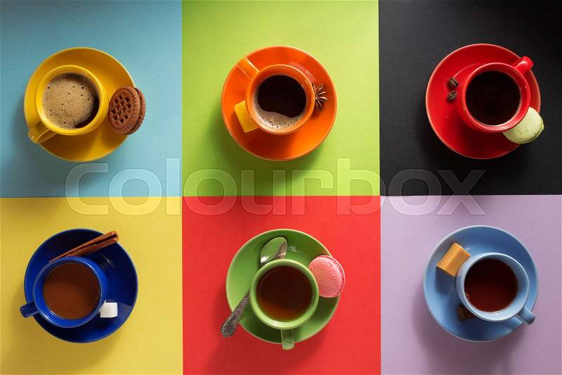 Cup of coffee, tea and cacao at colorful background, stock photo