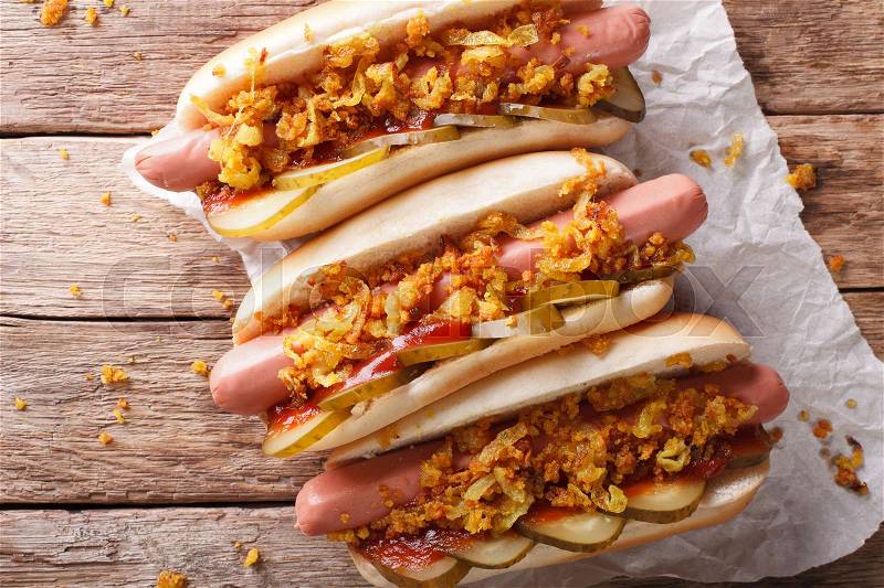 Danish street food: hot dogs close-up on the table. Horizontal view from above , stock photo