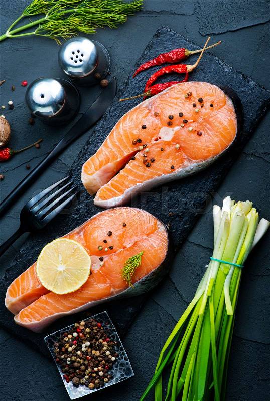 Fresh salmon with spice on a table, stock photo