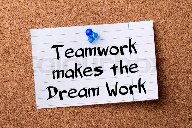 Teamwork makes the Dream Work - teared note paper pinned on bulletin board - horizontal image, stock photo
