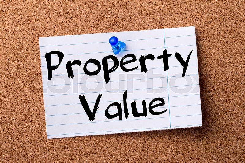 Property Value - teared note paper pinned on bulletin board - horizontal image, stock photo