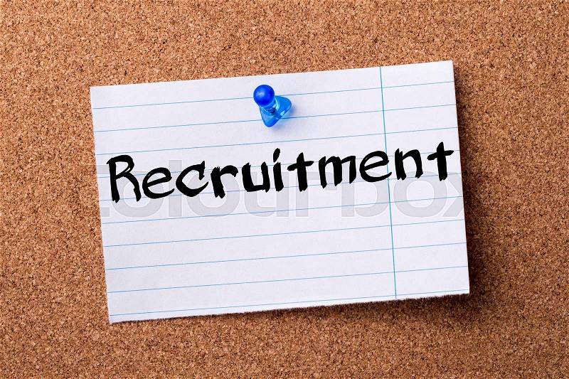 Recruitment - teared note paper pinned on bulletin board - horizontal image, stock photo