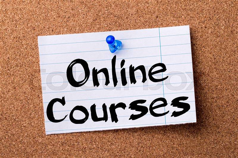 Online Courses - teared note paper pinned on bulletin board - horizontal image, stock photo