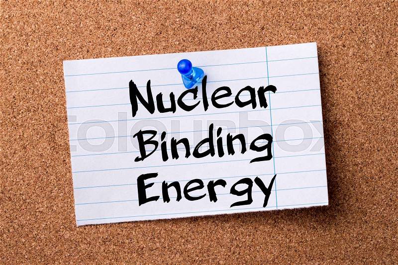 Nuclear Binding Energy - teared note paper pinned on bulletin board - horizontal image, stock photo