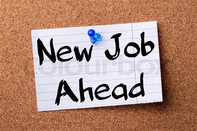 New Job Ahead - teared note paper pinned on bulletin board - horizontal image, stock photo