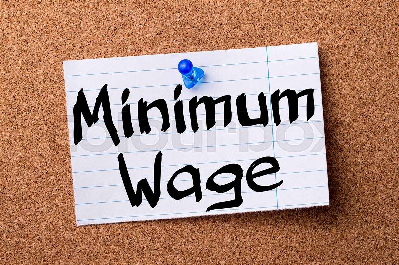 Minimum Wage - teared note paper pinned on bulletin board - horizontal image, stock photo