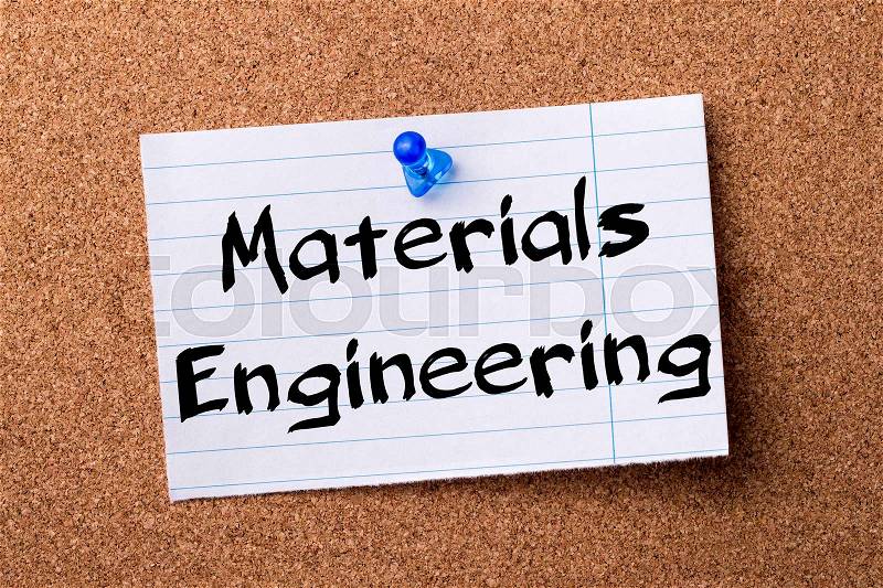 Materials Engineering - teared note paper pinned on bulletin board - horizontal image, stock photo