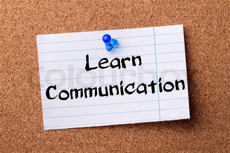 Learn Communication - teared note paper pinned on bulletin board - horizontal image, stock photo