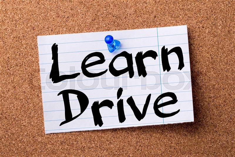 Learn Drive - teared note paper pinned on bulletin board - horizontal image, stock photo