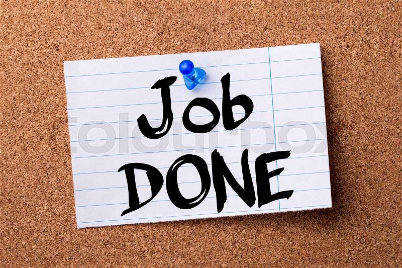 Job DONE - teared note paper pinned on bulletin board - horizontal image, stock photo