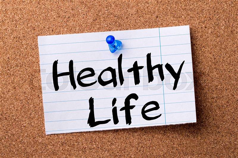Healthy Life - teared note paper pinned on bulletin board - horizontal image, stock photo