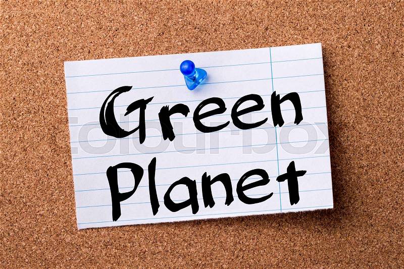 Green Planet - teared note paper pinned on bulletin board - horizontal image, stock photo