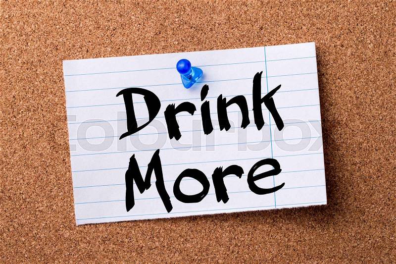 Drink More - teared note paper pinned on bulletin board - horizontal image, stock photo