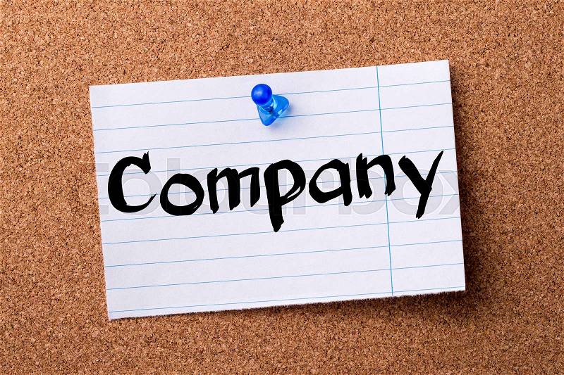 Company - teared note paper pinned on bulletin board - horizontal image, stock photo
