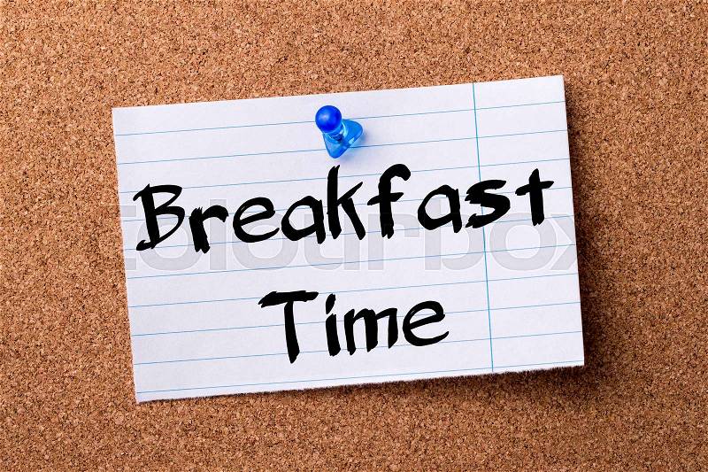 Breakfast Time - teared note paper pinned on bulletin board - horizontal image, stock photo