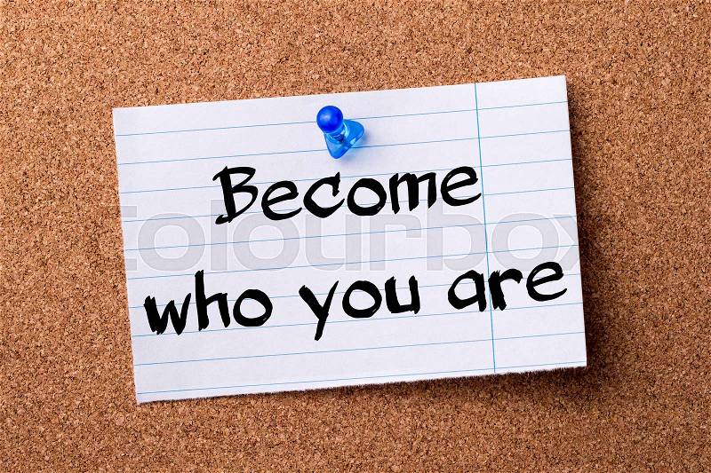 Become who you are - teared note paper pinned on bulletin board - horizontal image, stock photo