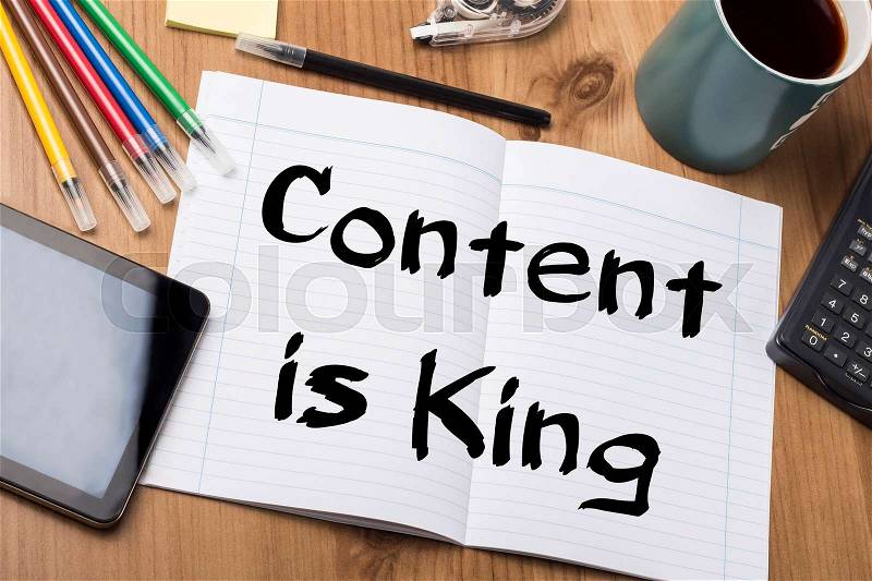 Content is King - Note Pad With Text On Wooden Table - with office tools, stock photo
